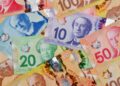 Pile of Canadian dollar bills in various denominations
