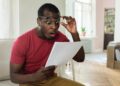 man looks surprised at investment growth