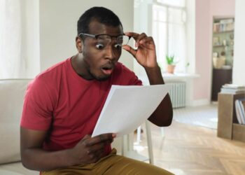 man looks surprised at investment growth