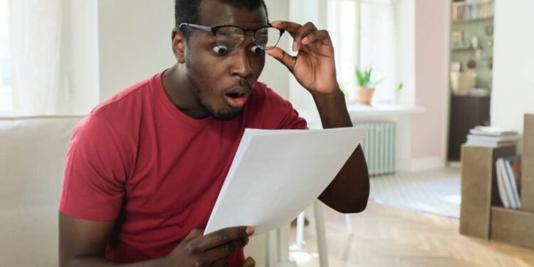 man looks surprised at investment growth