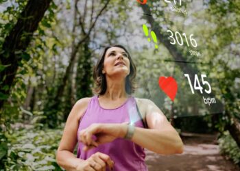 runner checks her biodata on smartwatch