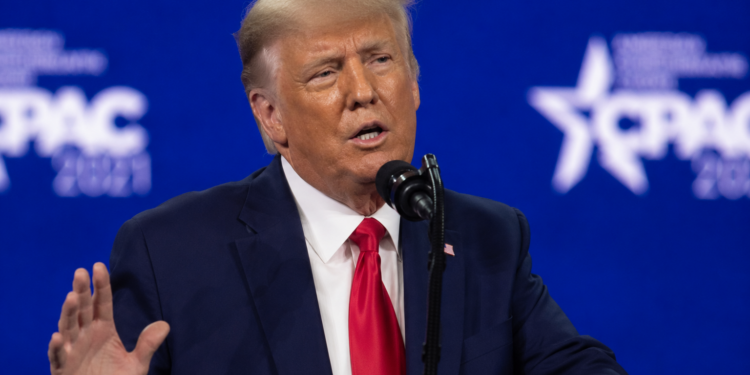 Donald Trump speaking at a conference