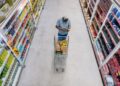 man shops at grocery store
