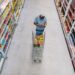 man shops at grocery store