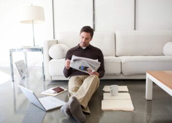 Investor reading the newspaper